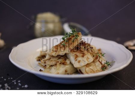 Dumplings Filled With Cabbage And Mushrooms. Fried Home-made Dumplings Stuffed With Mushrooms. Compo