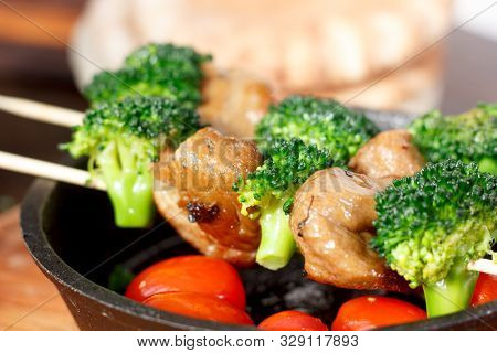 Vegan Kebabs With Seitan And Broccoli On Wooden Skewers