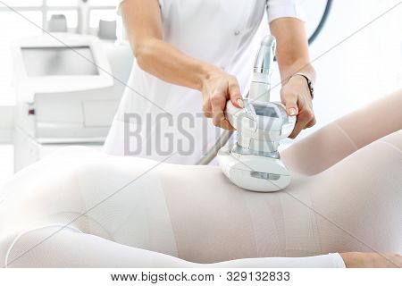 Vacuum Massage. Endermology, Abdominal Vacuum Massage. A Womans Body During A Care Treatment