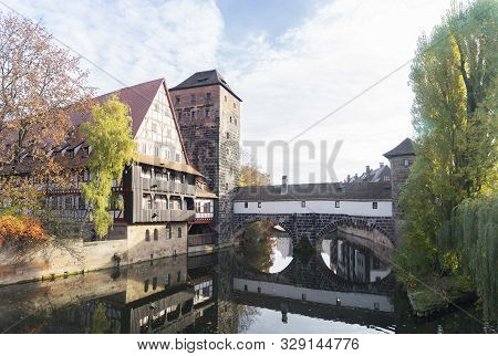 Old Town Of Nuremberg With Half-timbered Houses Over Pegnitz River Water, Germany