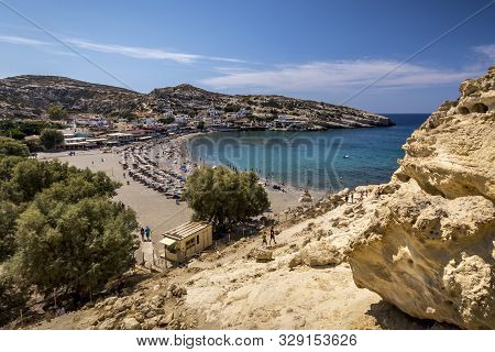 The Sea Coast And Mountains Of Matala On A Clear Summer Sunny Day. Crete, Greece.