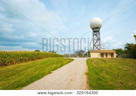 Weather Radar Tower Next To Corn Field.