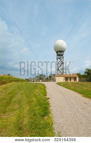 Weather Radar Tower Next To Corn Field.