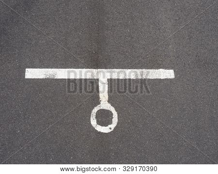 White Paint Line On Old Obsolete Asphalt Plaground. Empty Kids Areal.