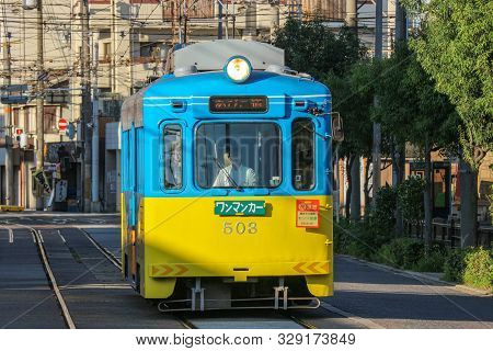 2017 October 09. Osaka Japan. Japanese Retro Railway Train, Hankai Tramway. Running Around Osaka Cit