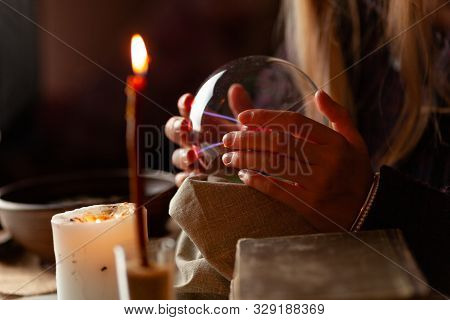 Seer With Magic Ball Performs Ritual. Psychic Vision, Fortune Teller.