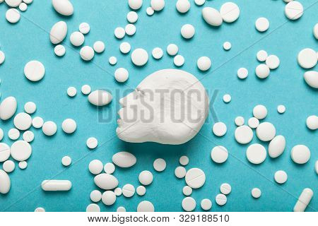 Placebo Effect, Headache Pills. Migraine. Blue Background
