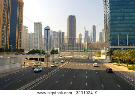 Dubai / Uae - October 21, 2019: Top View Of Jlt Road Looking On Dubai Marina. Traffic On Highway. Bi