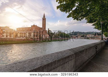Panoramic View On The Dige River In The Evening In Verona. Italy