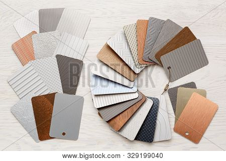 Samples Of Metal Laminate Laid Out In The Form Of A Circle, Plastic With A Metal Coating.