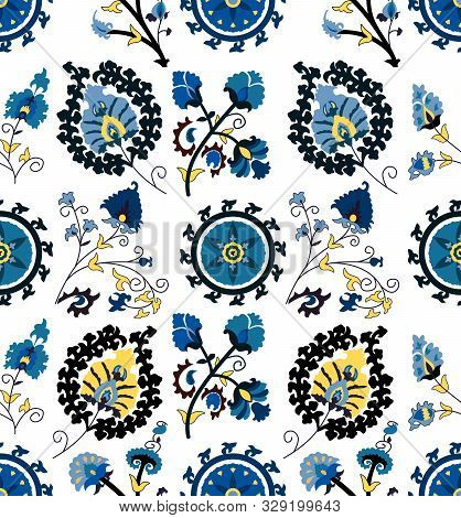 Seamless Colored Ethnic Flowers And Leaves Pattern On White Background. Designed For Textile Prints.