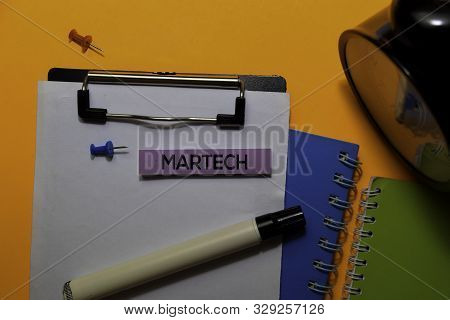 Martech Write On Sticky Notes. Isolated On Orange Table Background