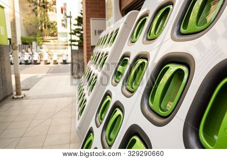 Taipei, Taiwan - August 17th, 2019: charging station for battery packs of Taiwan-based Gogoro electronic motocycle at street in Taipei, Taiwan, Asia