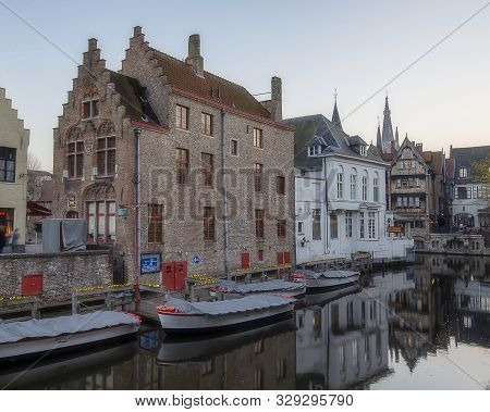 The Boats At The Greenery Canal In The Historic Center Of Bruges, Belgium