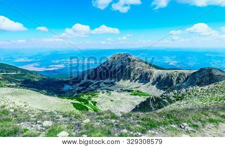 Amazing Alpine Landscape, Sunny Green Hills Under Blue Sky. Pirin Mountain, Bezbog Peak, Balkans, Bu