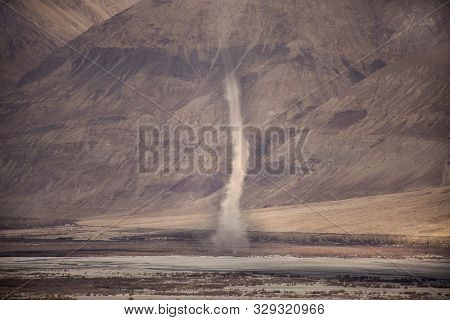 View Landscape And Sandstorm Cyclone In Hunder Or Hundar Village Of Nubra Tehsil Valley At Leh Ladak