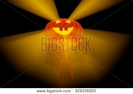 Flying White Ghost With Pumpkin Head And Boy Figure Covered With A Blanket Sheet On Black Background