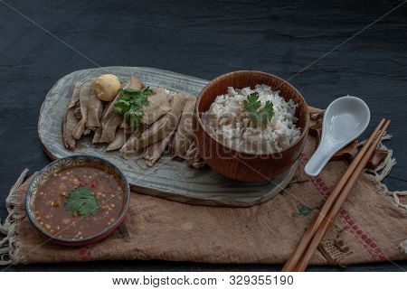 Asian Food Style Marinated Steamed Chicken (betong Chickken) With Rice And Sauce On Ceramic Plate. O