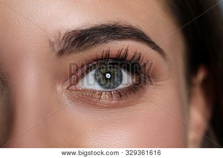 Amazing Female Green And Grey Coloured Eye With Tiny Bit Of Makeup Around Close-up