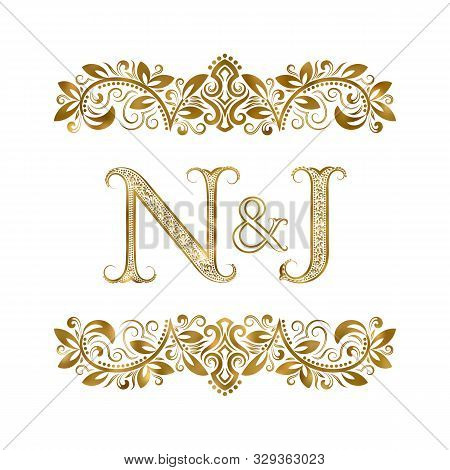 N And J Vintage Initials Logo Symbol. The Letters Are Surrounded By Ornamental Elements. Wedding Or 