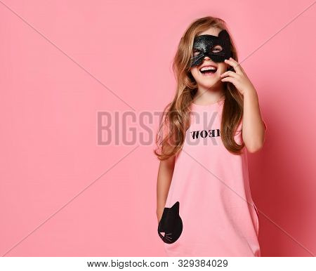 Christmas And New Year Concept. Louf Laughing Kid Girl Blonde With Long Wavy Hair In Cat Mask And Cu