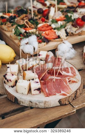 Various Foods Including Meat Snacks And Cheese.