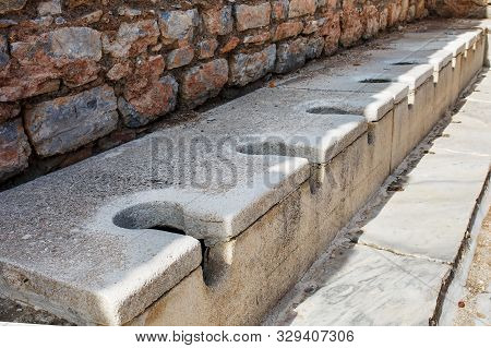 Antique Marble Public Toilet In The City Of Ephesus, Turkey.