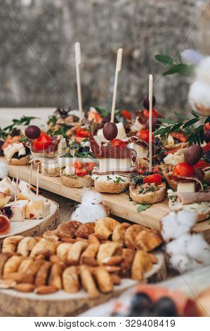Close Up Of Meat And Cheese Sandwiches. Nutritious Food