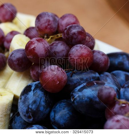 Assorted Fruit - Melon, Banana, Grapes. Fructarians Food