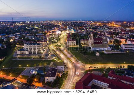 The Embankment, The Neman River And The Old Bridge In Grodno. Autumn , Evening, The City In The Suns