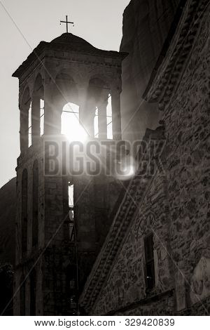 Bright Light Of Sunflare Through Church Bell Tower In Sepia Tone Old-fashioned Image Style