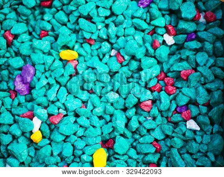 Fine Turquoise Pebbles. The Background Consists Of Small Turquoise Pebbles. With Many Possible Uses.