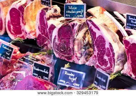 Munich, Germany - November 23, 2018 :counters And Showcases Of Butcher Shops At The Viktualienmarkt 