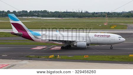 Airplane Taxi In Dusseldorf Airport