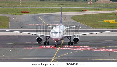 Airplane Taxi In Dusseldorf Airport