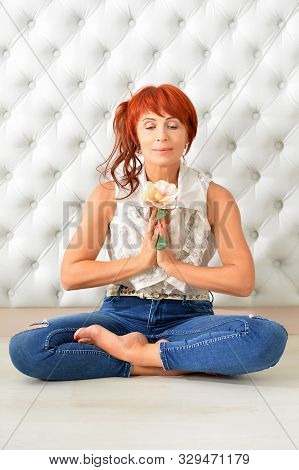 Portrait Of Beautiful Redhead Mature Woman Posing