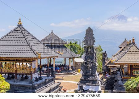 BALI, INDONESIA - SEPTEMBER 17, 2019: People at the temple of Pura Penataran Agung Lempuyang. In Bali, Indonesia