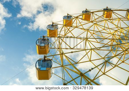 Big Ferris Whell At Blue Cloud  Sky Background In Yoshkar-ola