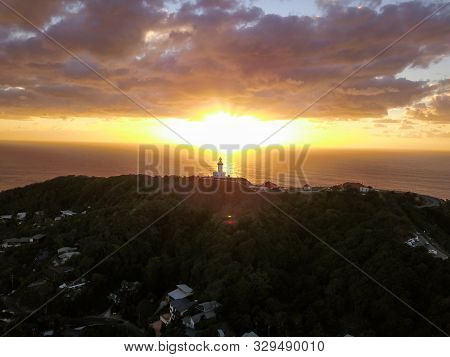 Drone Shot Of Byron Bays Lighthouse At Sunrise, Australias Most Eastern Point.