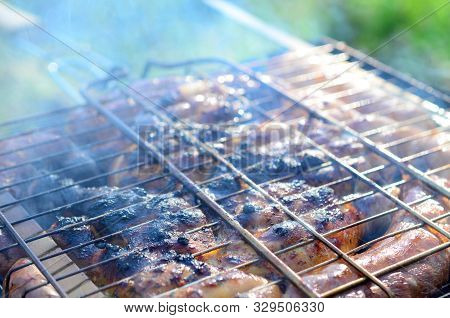 Poor And Improper Cooking Meat On Fire. Toasted Meat With Overcooked Crust