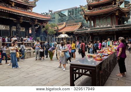 Taipei, Taiwan - October 20th, 2019: famous attraction of Lungshan temple at Taipei, Taiwan