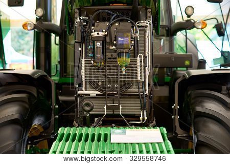 Chisinau, Moldova, October 22, 2019. Green Tractor John Deere, Engine Compartment With Open Hoods