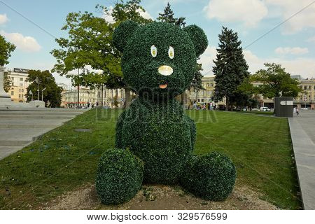 Kharkiv, Ukraine, August 2019 Big Teddy Bear Topiary Figure In City Park. Outdoor Fun Decoration Fro