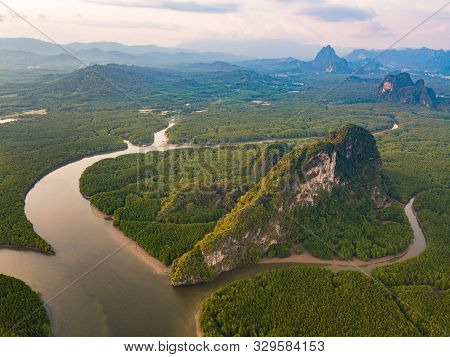 Aerial Top View Of Samet Nangshe And Tropical Green Forest Trees At Sunset With Andaman Sea In Phang
