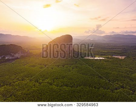 Aerial Top View Of Samet Nangshe And Tropical Green Forest Trees At Sunset With Andaman Sea In Phang