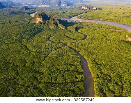 Aerial Top View Of Samet Nangshe And Tropical Green Forest Trees At Sunset With Andaman Sea In Phang