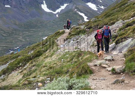 Jotunheimen, Norway - August 1, 2015: People Hike At Besseggen Trail In Jotunheimen National Park, N