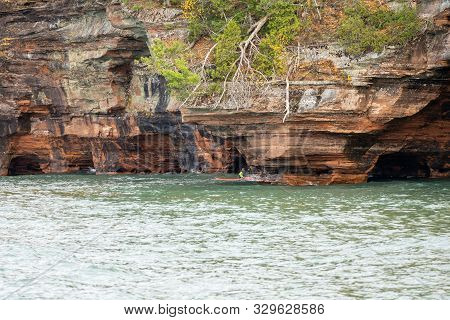 Bayfield, Wisconsin - October 19, 2019: A Group Of Happy, Smiling Kayakers Explore The Apostle Islan