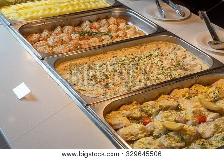 Buffet In The Dining Room-fish, Beef, Mashed Potatoes, Cutlets, . Smorgasbord