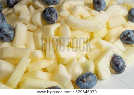 Fruit Platter - Melon, Plum. Sliced Fruit On A Plate